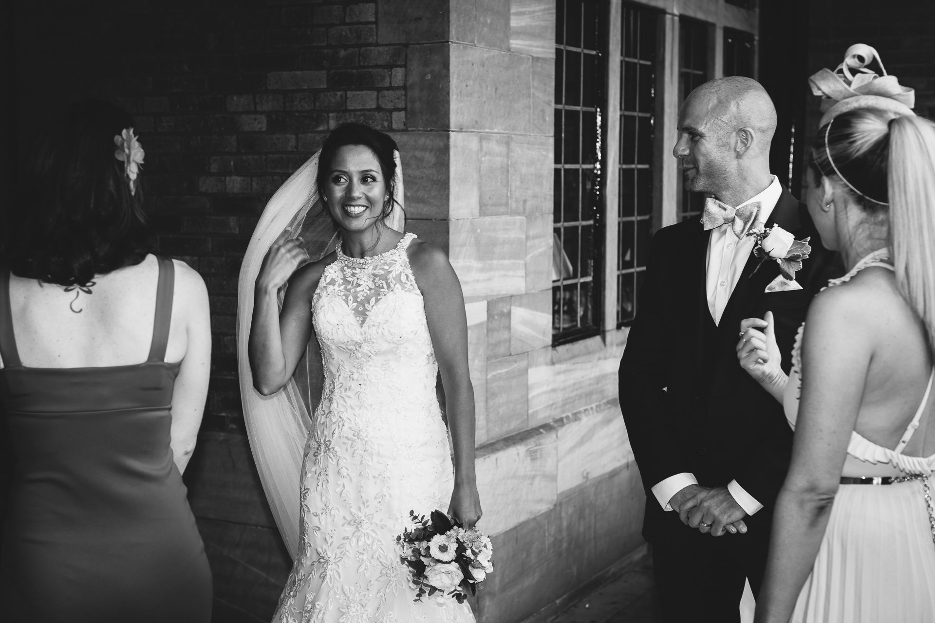 Wedding photography of bride chatting at Cheshire wedding venue Inglewood manor